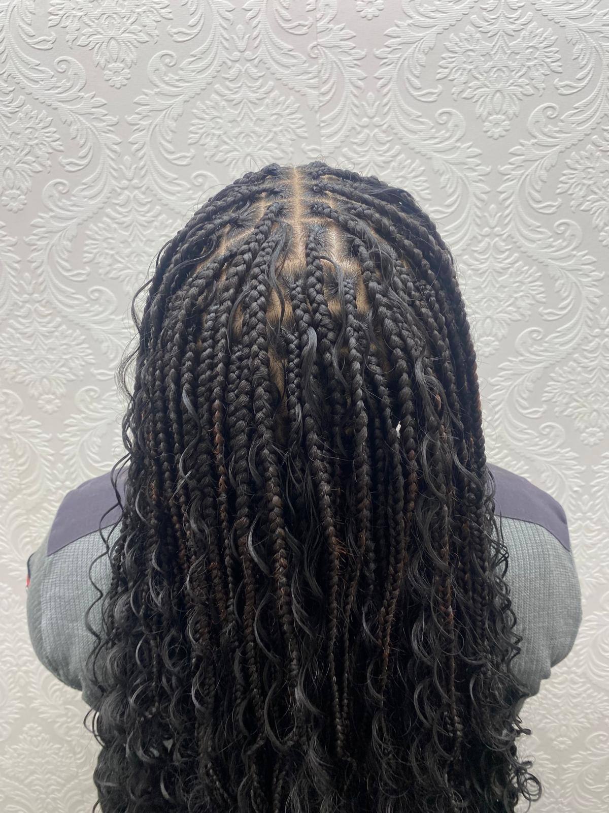 Boho braids with curl accents, back view