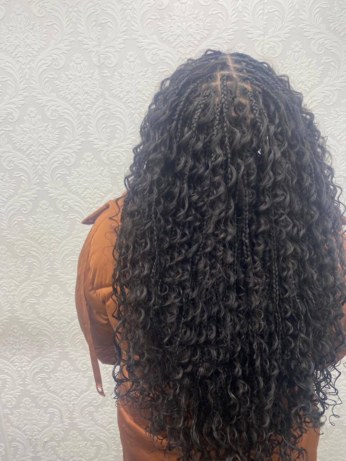 Boho braids with defined curls, side view