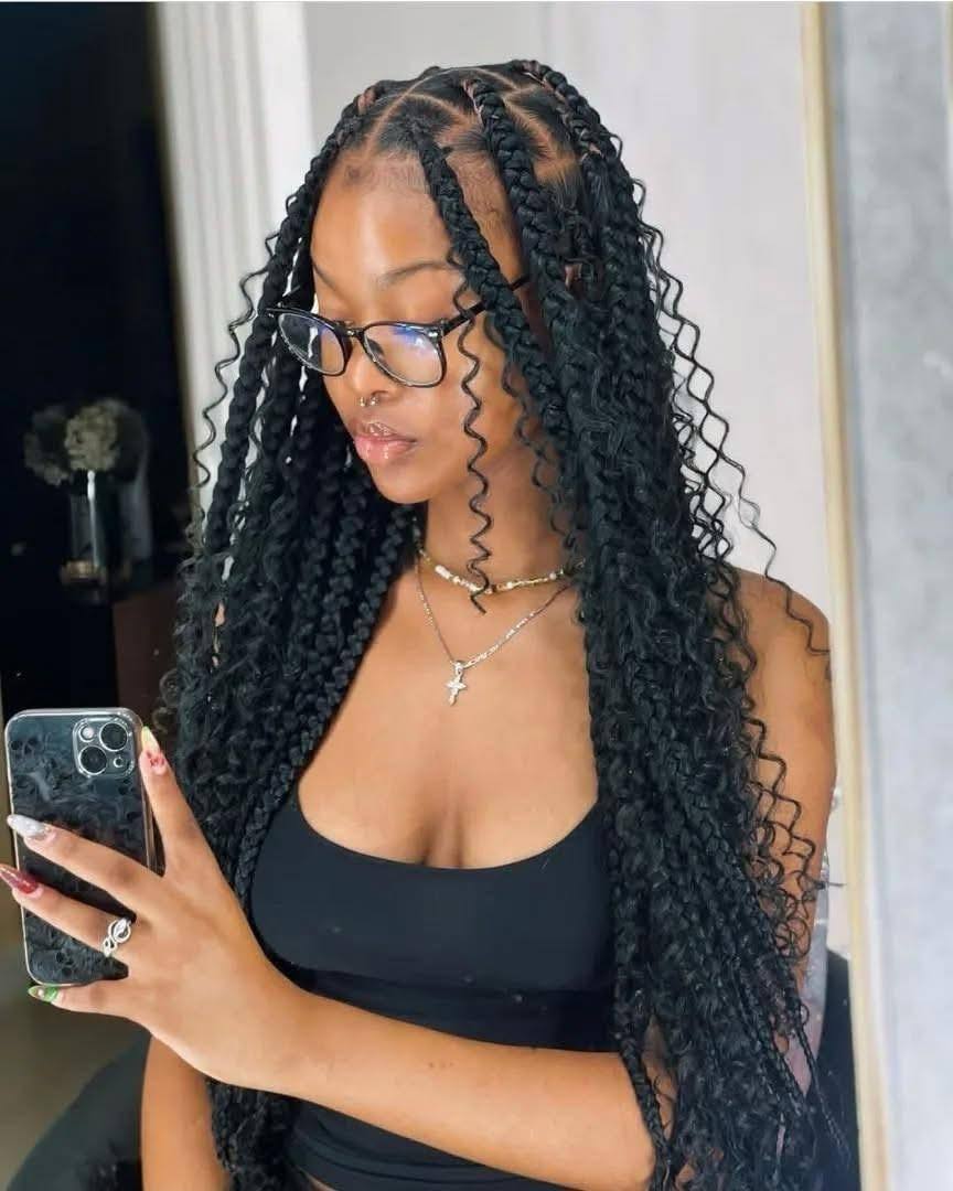 Long boho braids with curl accents
