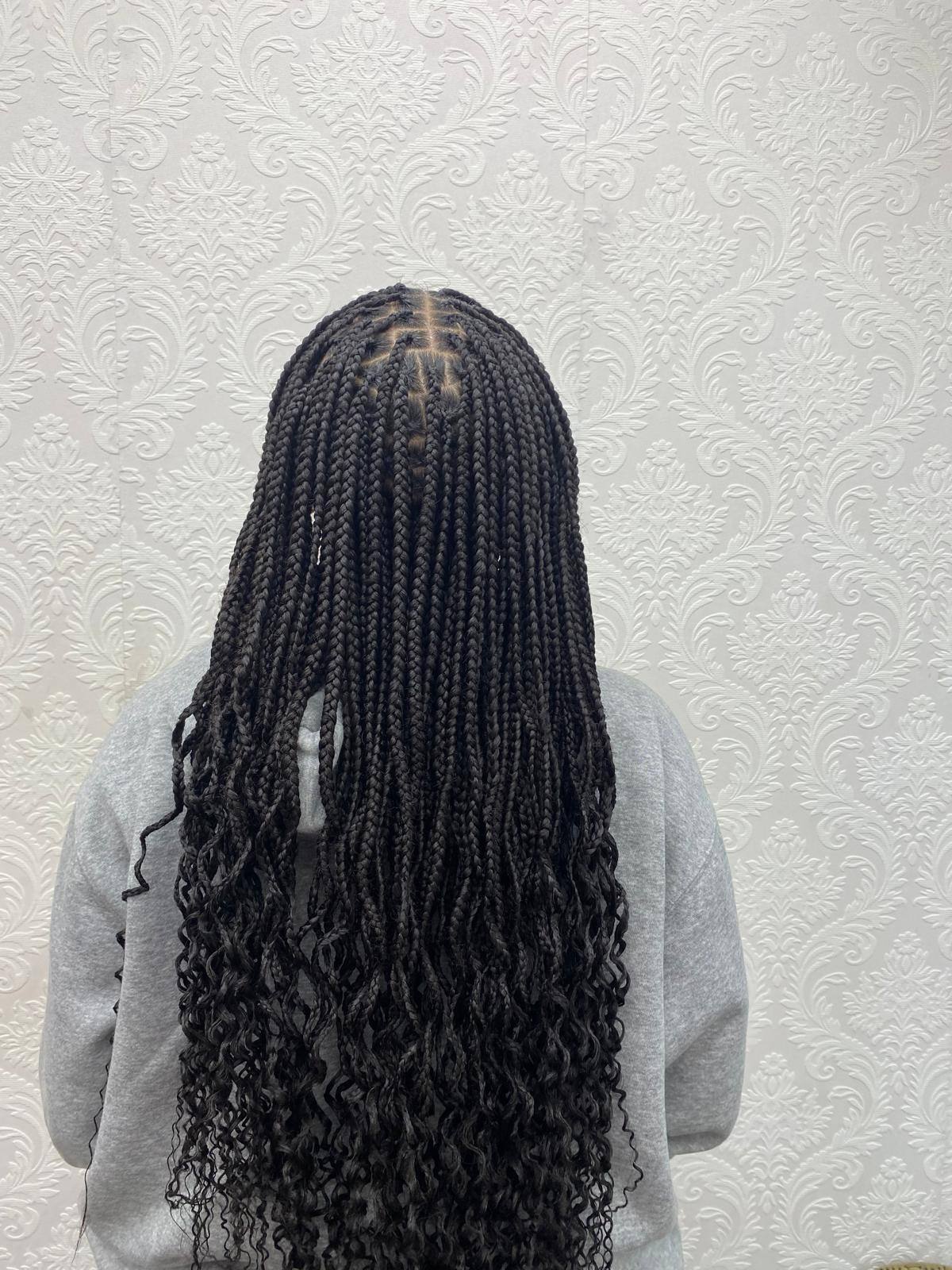 Boho knotless braids with curly ends, back view