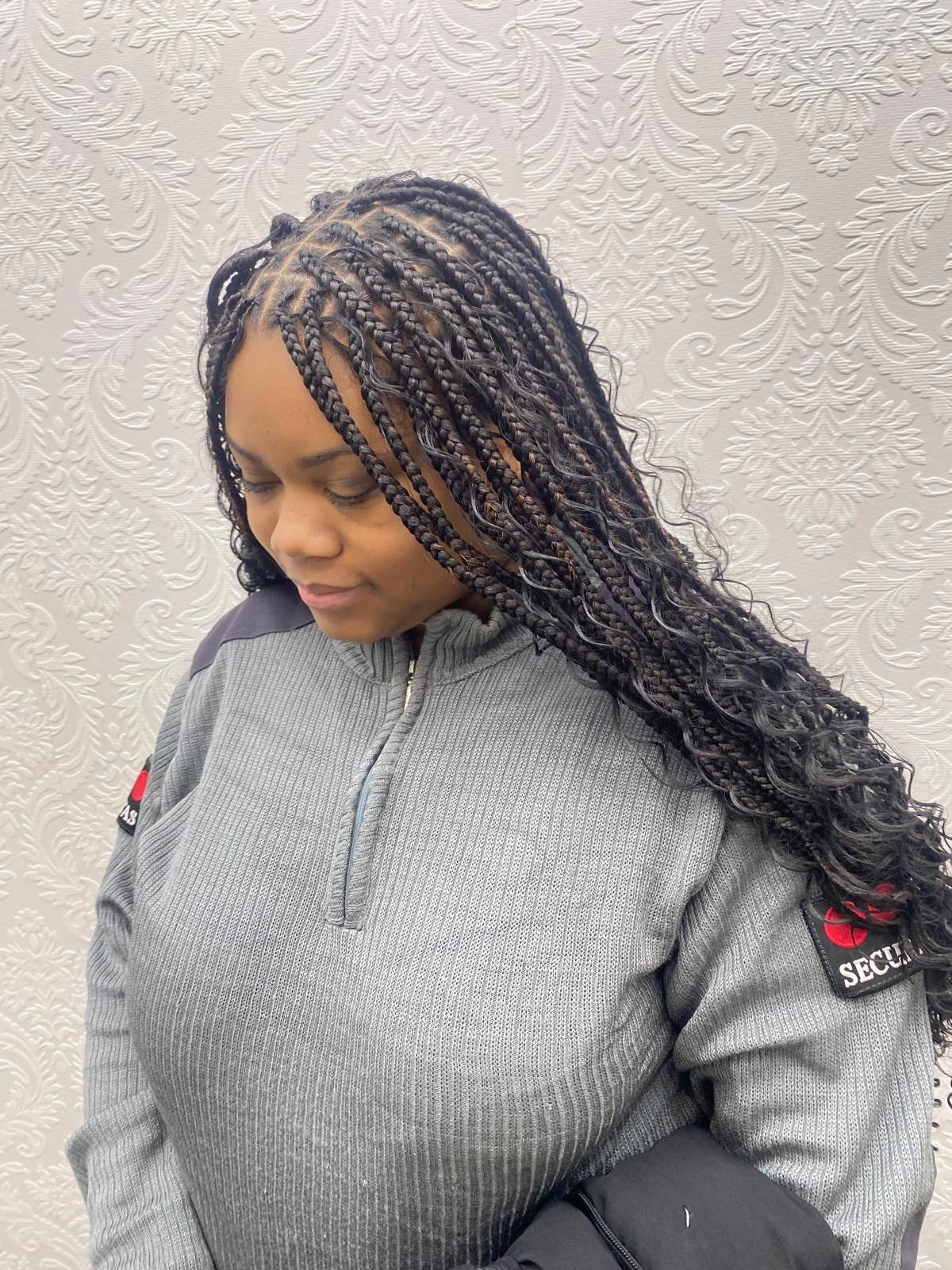 Boho knotless braids with curls, front view