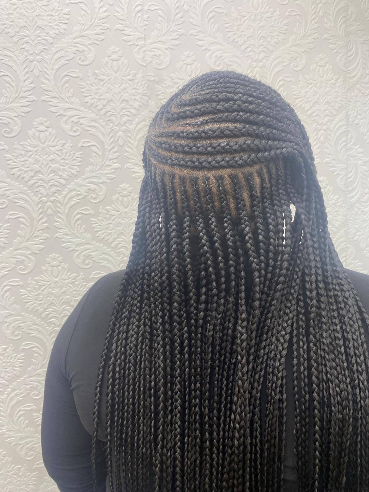 Knotless braids at full length, straight back view