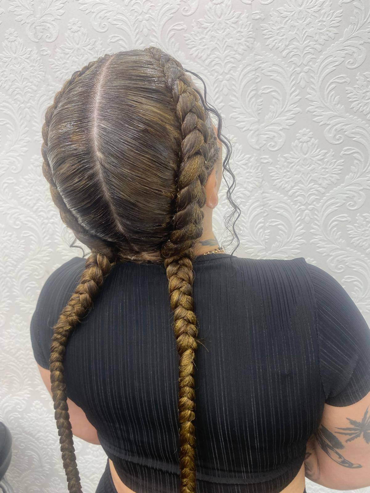 Two feed-in cornrows braided to the back in ombre tones